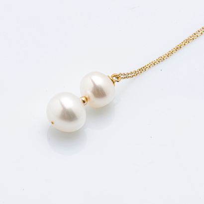 Chaîne et son pendentif en or jaune 9 carats...