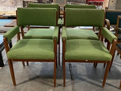 Suite de quatre fauteuils en bois vernis,...