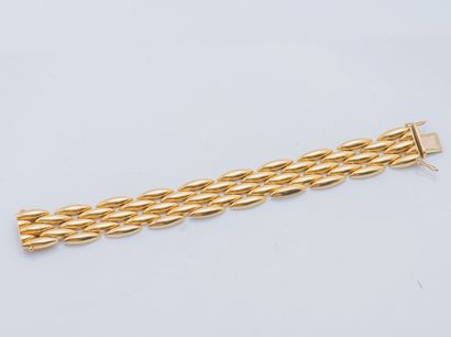 CARTIER
Bracelet articulé en or jaune 18...