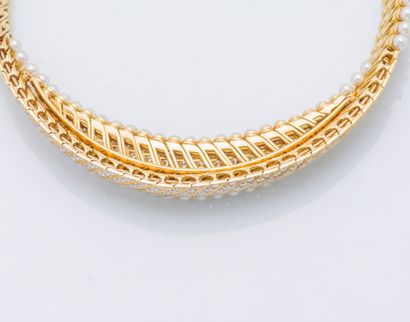Collier ras de cou articulé en or jaune 18...