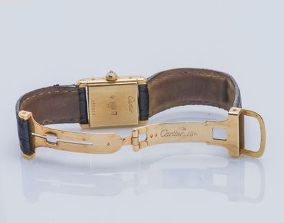 CARTIER
Montre Tank mini de dame en or jaune...