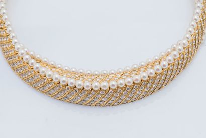 Collier ras de cou articulé en or jaune 18...