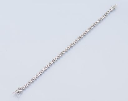 Bracelet ligne en argent (925 ‰) dessinant...