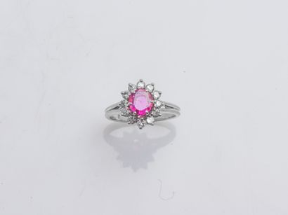Bague fleur en or gris 18 carats (750 ‰)...