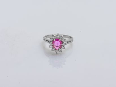 Bague fleur en or gris 18 carats (750 ‰)...
