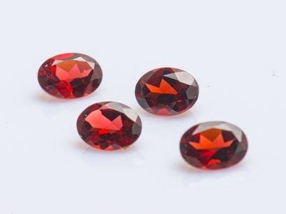Lot of 4 oval almandine garnets, approx....