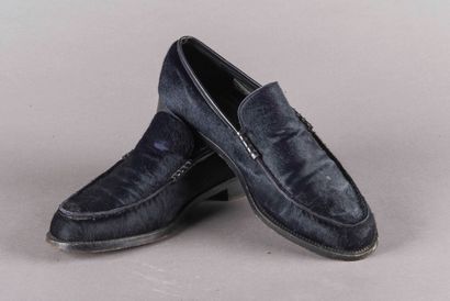 TOD'S 
Paire de mocassins en cuir. 
Taille...