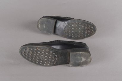 TOD'S 
Paire de mocassins en cuir. 
Taille...