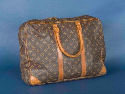 Louis VUITTON 
Sac 24 heures en toile Monogram....