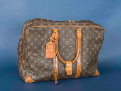 Louis VUITTON 
Sac 24 heures en toile Monogram....