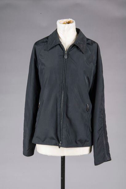 HERMES 
Veste zippée en syntéhtique noire,...
