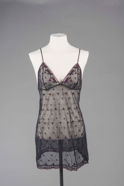 CHRISTIAN DIOR 
Nuisette noire brodée de...