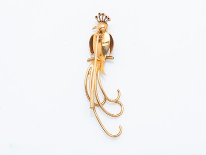 Broche en or jaune 18 carats (750 ‰) stylisant...