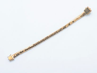 Bracelet gourmette en or jaune 14 carats...