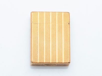 DUPONT
Gilded metal lighter with chased checkered...