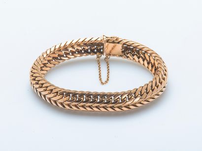 Bracelet gourmette en or jaune 18 carats...