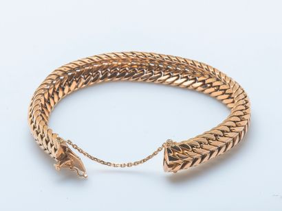 Bracelet gourmette en or jaune 18 carats...
