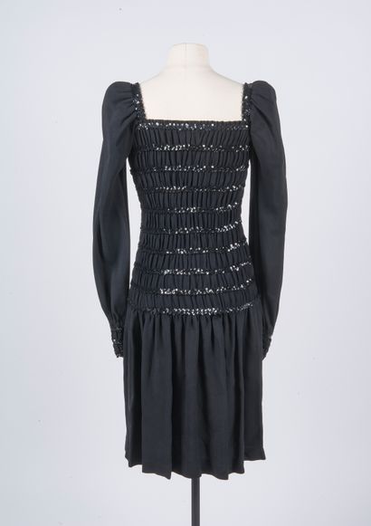 SAINT LAURENT Rive gauche
Smocked silk dress,...
