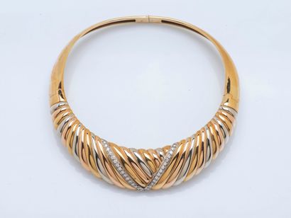 Three-part articulated torque necklace adorned...