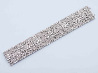 Large openwork, articulated ribbon bracelet...