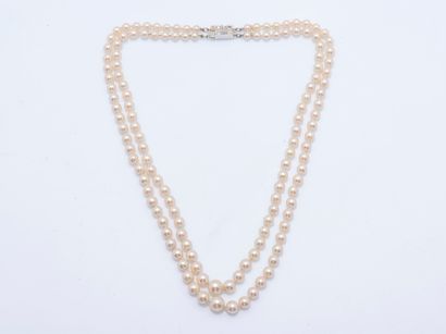 Double strand necklace of tumbling cultured...