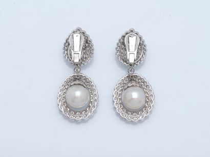 Pair of 18K (750 ‰) white gold earrings,...