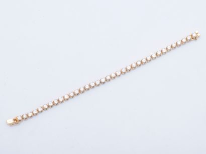 Line or Tennis bracelet in 18K yellow gold...