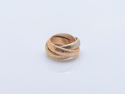 HERMÈS Paris
Ring formed of three 18K (750...