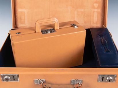 A. HARDY
Beige leather travel trunk comprising...