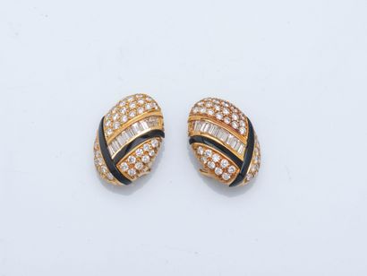 Pair of 18K yellow gold (750 ‰) ear clips...