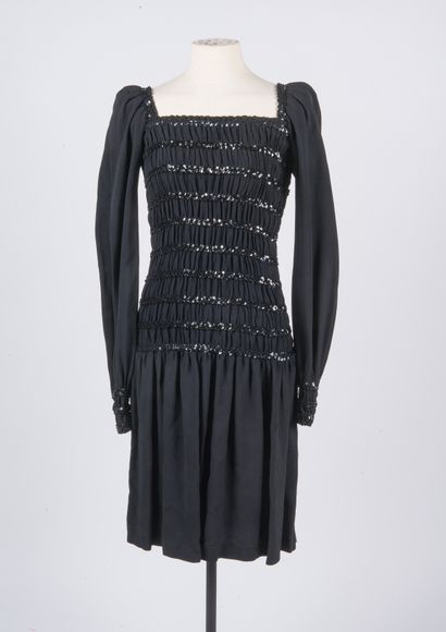 SAINT LAURENT Rive gauche
Smocked silk dress,...