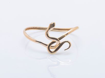 18K (750 ‰) yellow gold openwork bangle featuring...