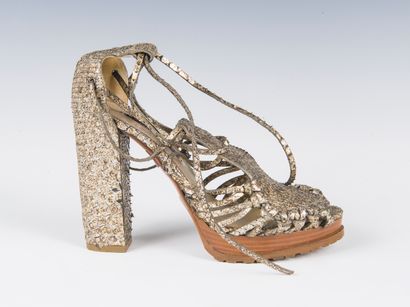RALPH LAUREN
Pair of gold-tone python lace-up...