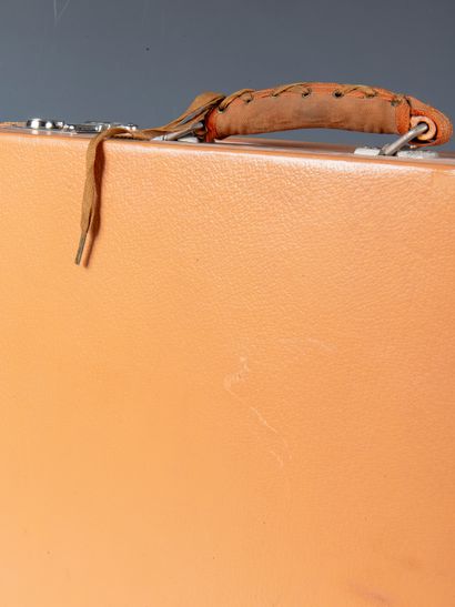 A. HARDY
Beige leather travel trunk comprising...