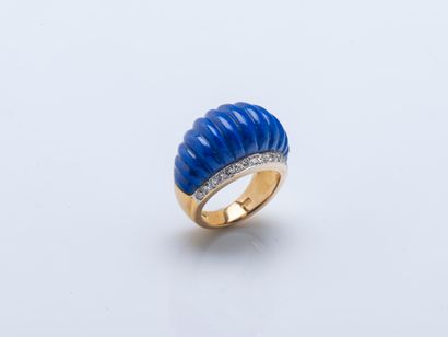 18K yellow gold (750 ‰) cambered band ring...