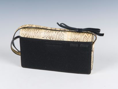 MIU MIU
Shoulder bag in python, scratch fastening...