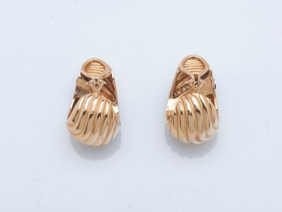 Pair of large oblong creoles in 14K yellow...