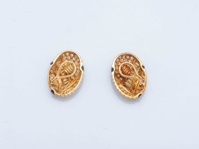 Pair of 18K yellow gold (750 ‰) ear clips...