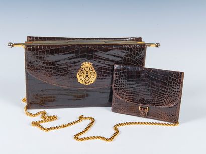DUC
Stiff bag in chocolate crocodile leather...