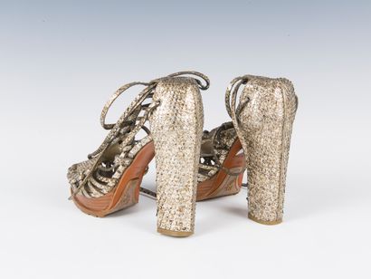 RALPH LAUREN
Pair of gold-tone python lace-up...