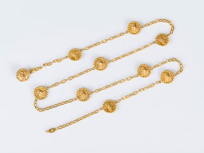 CHANEL, 1982
Gilt metal belt adorned with...