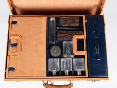 A. HARDY
Beige leather travel trunk comprising...