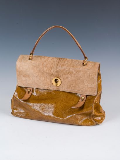 YVES SAINT LAURENT, 2008
Muse two bag in...