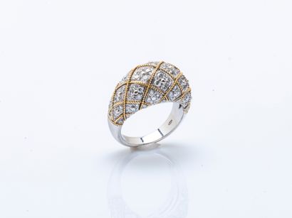Bague dôme en or gris et or jaune 18 carats...