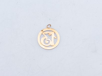 Round openwork pendant in 18K yellow gold...
