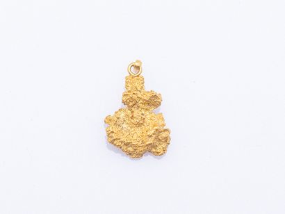 18K yellow gold pendant (750 ‰) adorned with...