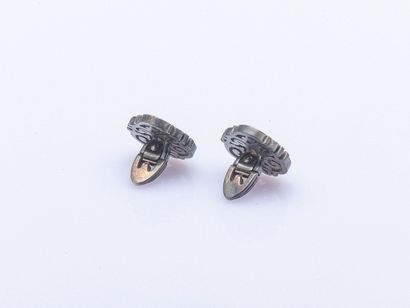 Pair of silver cufflinks (800 ‰) monogrammed....