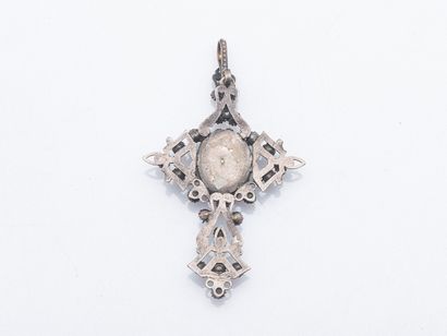 Metal cross pendant set with faceted pink...