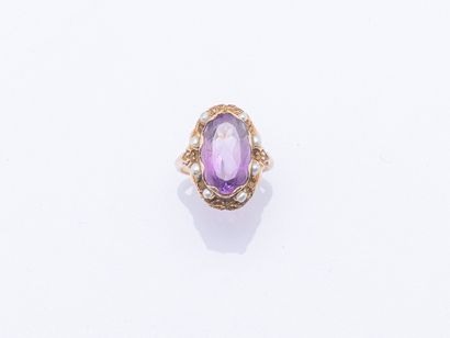 14K rose gold ring (585 ‰) adorned with an...