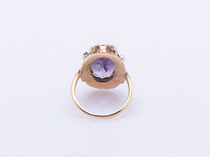 14K rose gold ring (585 ‰) adorned with an...